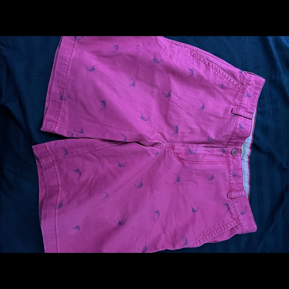 Cargo shorts with sword fish print all around.